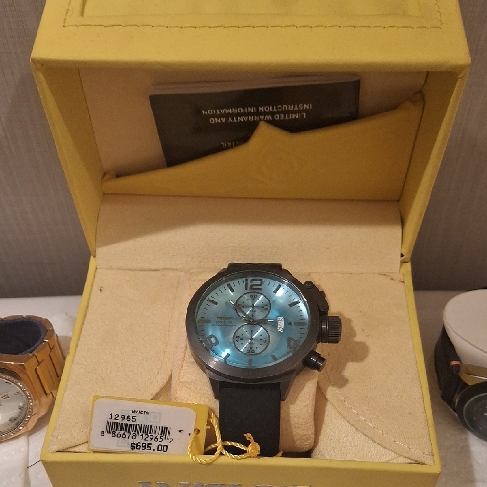 Invicta Turquoise Dial Watch with Black Strap